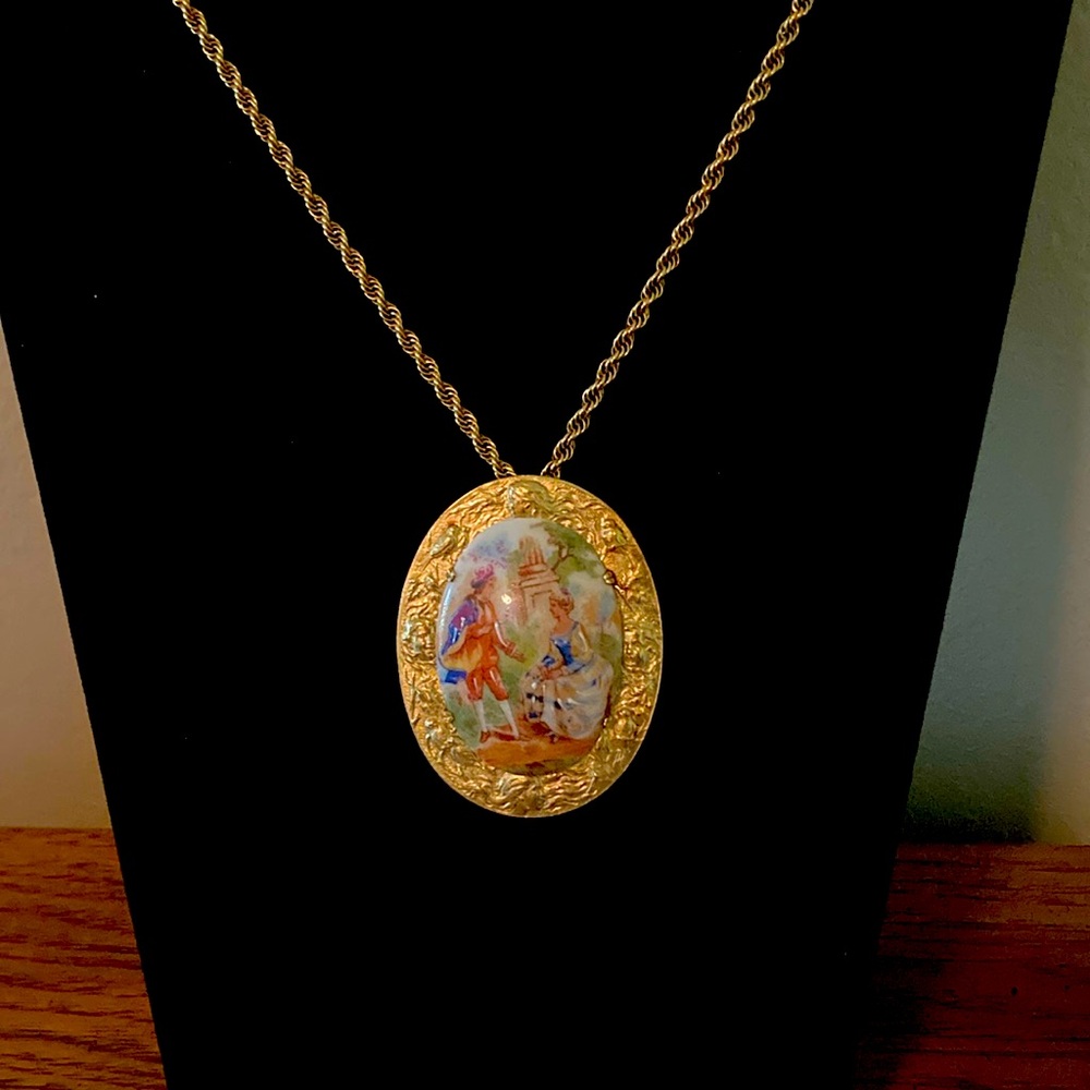 Limoges pendant with 22” gold metal chain and embossed casing